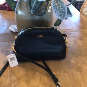 COACH black leather crossbody bag.